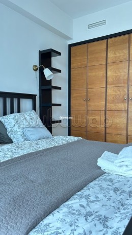 location-dun-appartement-a-de-la-plage-surface-totale-95-m2-porte-blindee-salon-marocain-traditionnel-big-11