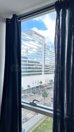 location-dun-appartement-a-de-la-plage-surface-totale-95-m2-porte-blindee-salon-marocain-traditionnel-big-13