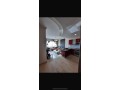appartements-a-louer-a-de-la-plage-1-piece-salon-traditionnel-et-porte-blindee-small-2