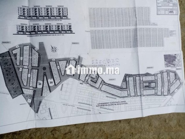 terrain-70-metre-garage-2-lotissement-wahda-big-0