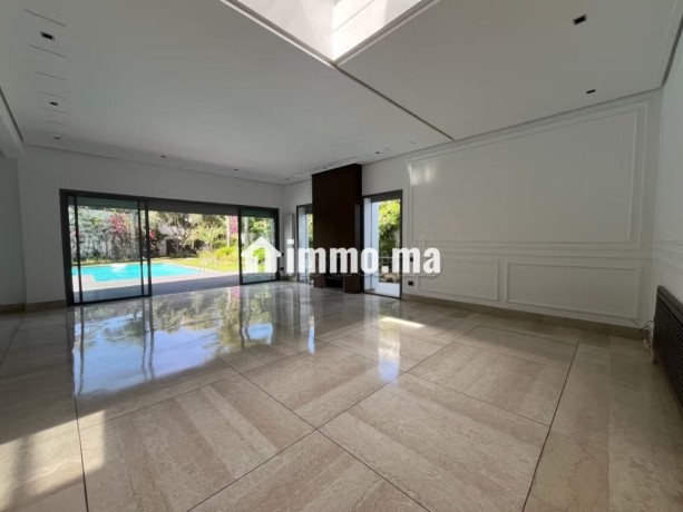 location-villa-de-luxe-a-ain-diab-superficie-500-m2-cheminee-piscine-big-2