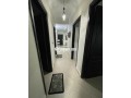 appartement-a-cote-du-terrain-small-1