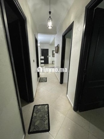 appartement-a-cote-du-terrain-big-1