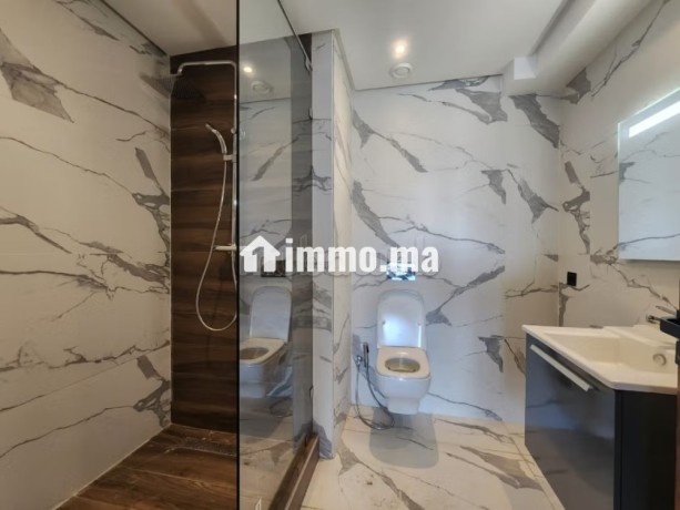 superbe-appartement-a-louer-a-casablanca-finance-city-superficie-120-m2-avec-ascenseur-et-espace-vert-big-7