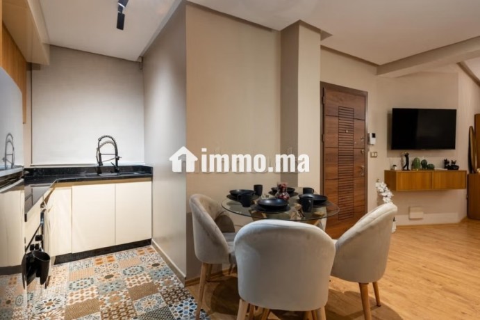 location-saisonniere-en-hassan-centre-ville-1-chambre-ascenseur-et-places-de-parking-big-9