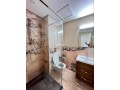 location-dun-appartement-a-beausejour-2-chambres-agreables-ascenseur-et-places-de-parking-small-2