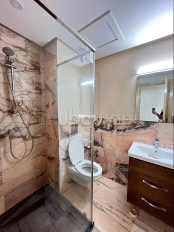 location-dun-appartement-a-beausejour-2-chambres-agreables-ascenseur-et-places-de-parking-big-2