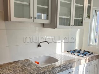 Location d'un appartement en Hassan Centre Ville. Superficie 70 m². Spacieux salon européen - Appartement à louer - Rabat