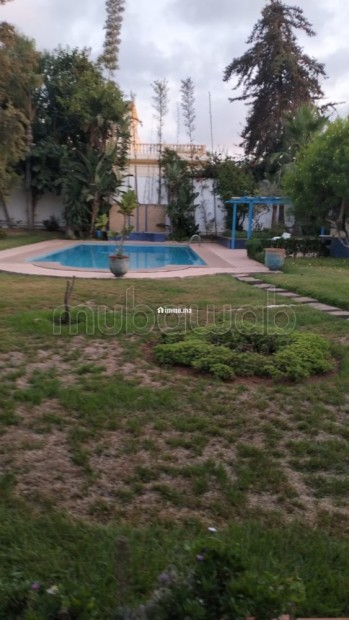 Somptueuse villa à vendre à Souissi. 4 chambres. Places de parking et beau jardin - Vente Immobilier - Rabat - photo 1