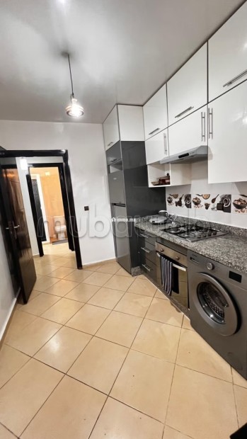 Location d'un appartement à Hay Salam.
Surface de 80 m².
Ascenseur et garage - Vente Immobilier - Agadir - photo 8