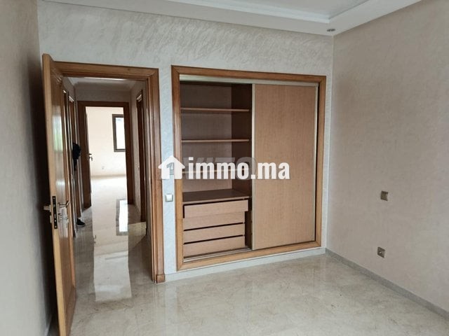 APPARTEMENT À LOUER DANS UNE RÉSIDENCE FERMÉE À RACINE - Location Immobilier - Casablanca - photo 2