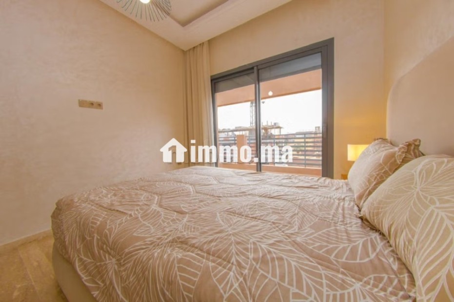 Très bel appartement en location à Samlalia.
Surface totale 80 m².
Bien meublé - Location Immobilier - Marrakech - photo 4