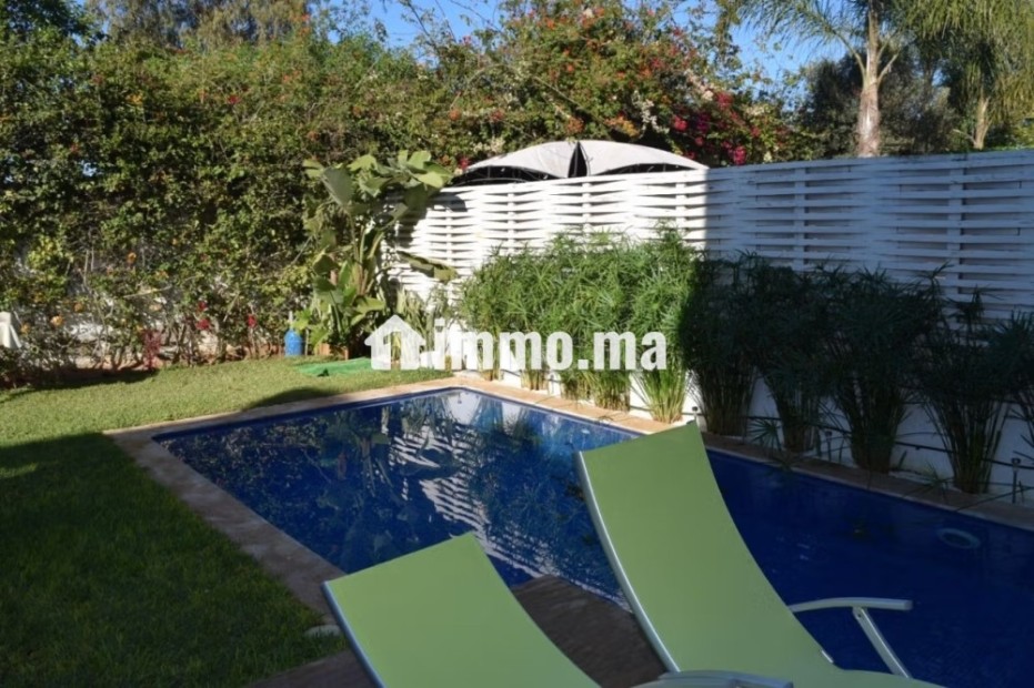 À VENDRE – Villa Jumelée 3 Façades avec Piscine Privative dans Résidence Fermée - Vente Immobilier - Dar Bouazza - photo 8