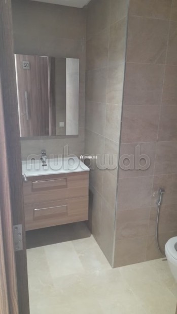 Bel appartement en location en Centre Ville. 4 pièces confortables. Parking et jardin - Location Immobilier - Temara - photo 8