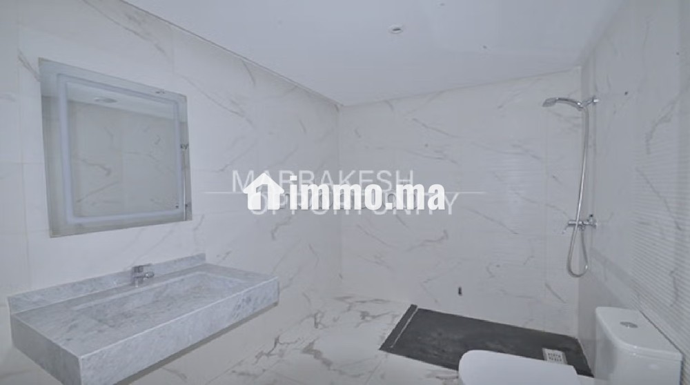 Un bel appartement proposé pour la location longue durée situé à la Palmeraie - Location Immobilier - Marrakech - photo 6