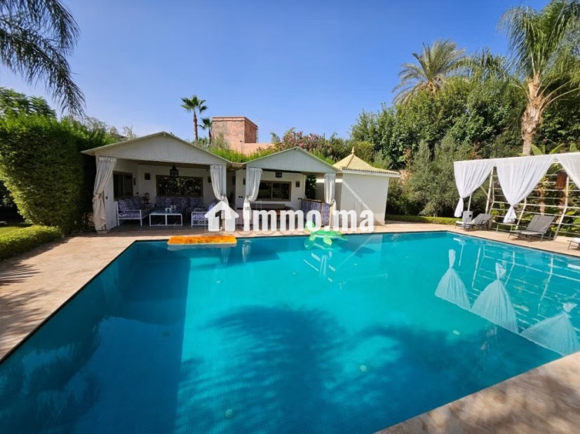 Vente d'un superbe riad à Route Amizmiz.
Superficie 3160 m².
Belle terrasse et jardin - Vente Immobilier - Marrakech - photo 3