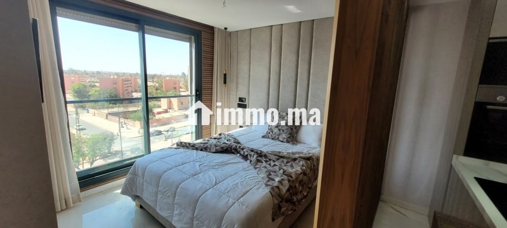 Appartement à l'achat à Boulevard Med 6.
Surface de 45 m².
Vue sur les montagnes, chauffage central - Vente Immobilier - Marrakech - photo 5