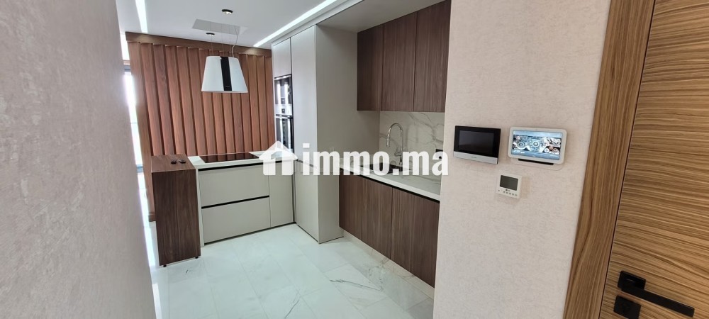 Appartement à l'achat à Boulevard Med 6.
Surface de 45 m².
Vue sur les montagnes, chauffage central - Vente Immobilier - Marrakech - photo 8