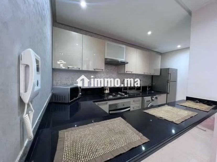 Location saisonnière à Guéliz. Surface de 90 m². Antenne parabolique, résidence sécurisée - Vente Immobilier - Marrakech - photo 4