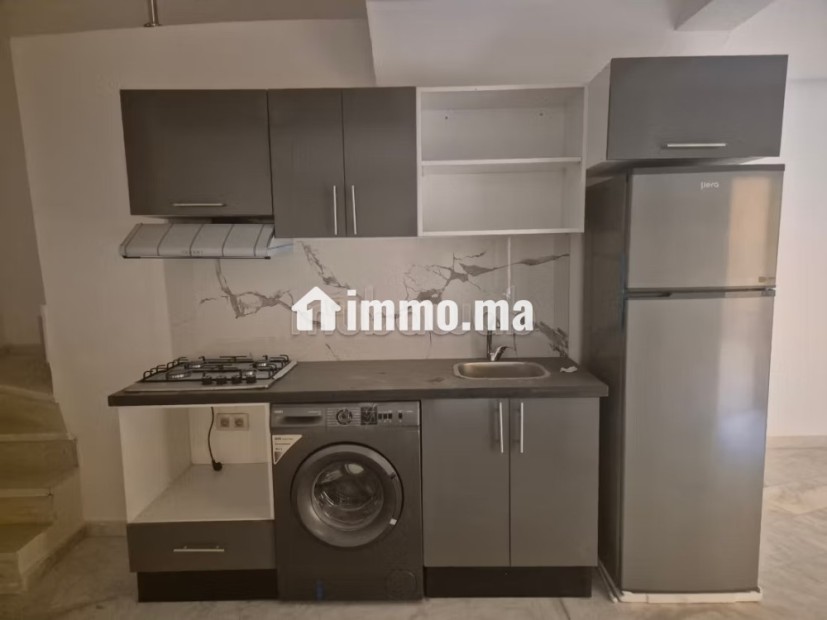 Appartement à vendre à Guéliz. Surface totale 106 m². Ascenseur et terrasse - Vente Immobilier - Marrakech - photo 8