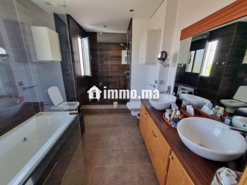 Maison de luxe à vendre à Ville Verte. 7 pièces. Belle terrasse et jardin - Vente Immobilier - Bouskoura - photo 3