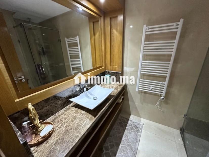 Bel appartement à vendre à Oasis. 3 chambres. Avec ascenseur et terrasse - Vente Immobilier - Casablanca - photo 6