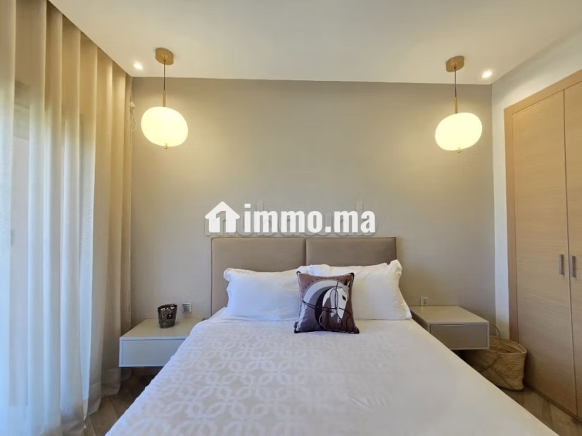 Location saisonnière à Boulevard Med 6.
Surface de 92 m².
Ascenseur et stationnement - Vente Immobilier - Marrakech - photo 7