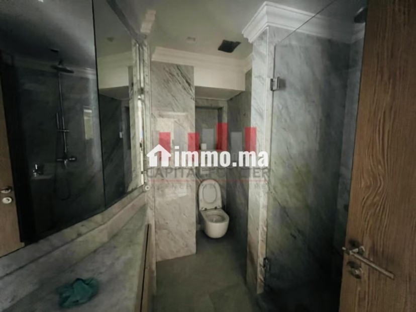 Bel appartement à vendre à Racine. 2 chambres agréables. Garage privé - Vente Immobilier - Casablanca - photo 6