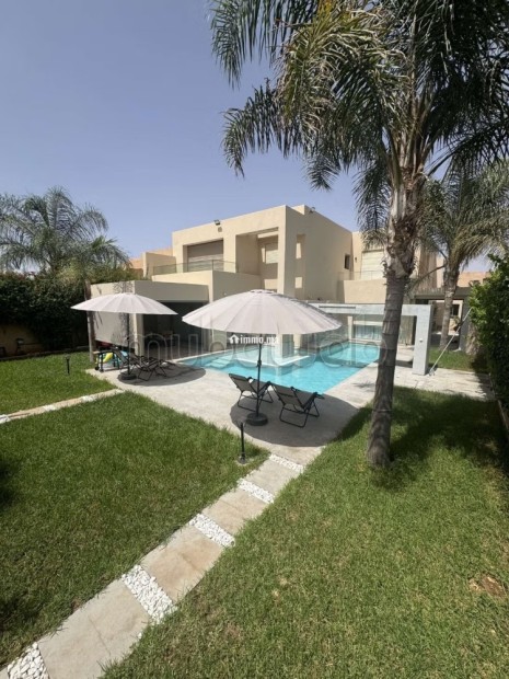 Somptueuse villa à vendre à Agdal. 5 chambres. Meublé - Vente Immobilier - Marrakech - photo 1