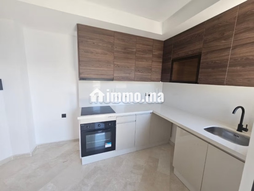 Superbe appartement à vendre à Ferme Bretonne Hay Arraha. 2 chambres agréables. Fenêtres double vitrage et chauffage central - Vente Immobilier - Casablanca - photo 3