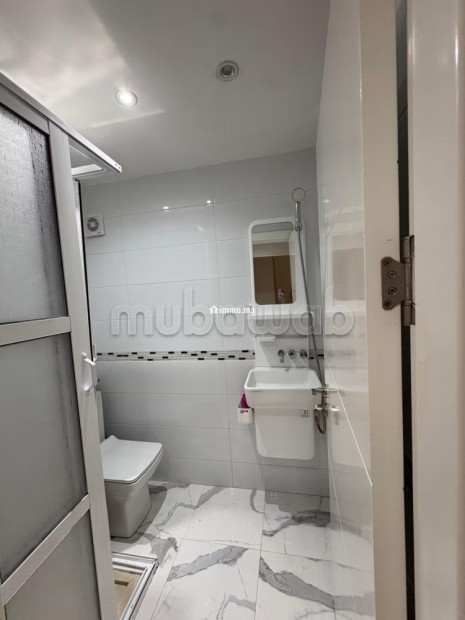 Location d'un appartement à M'Diq. 2 chambres. Système de parabole et résidence sécurisée - Vente Immobilier - Mdiq - photo 6