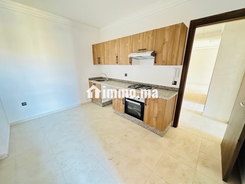 Superbe appartement à vendre à Hivernage.
Surface de 98 m².
Jardin et terrasse - Vente Immobilier - Marrakech - photo 3
