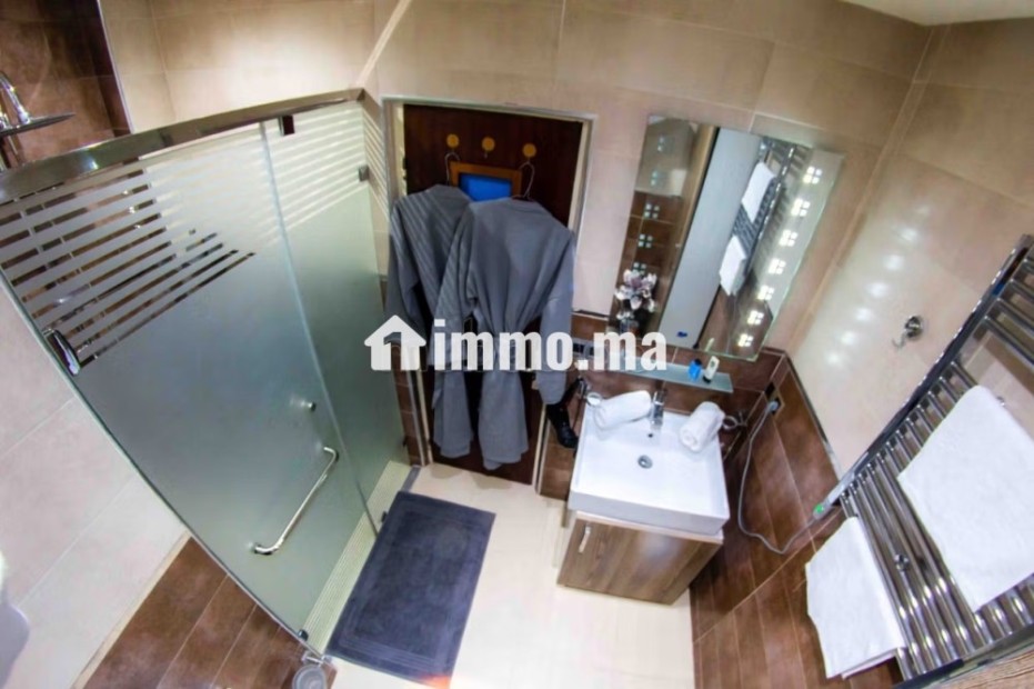Location d'un appartement à Agdal. Surface totale 85 m². Bien meublé - Location Immobilier - Rabat - photo 6