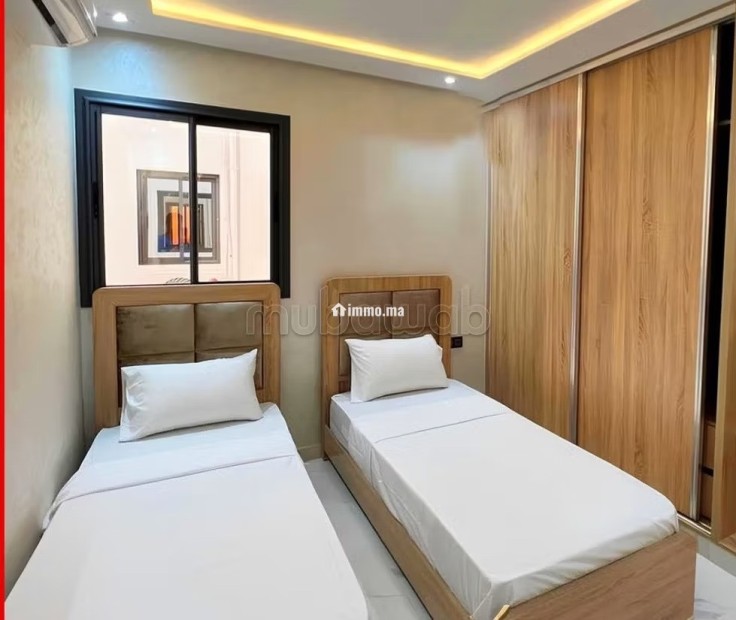 Location saisonnière en Centre ville. Surface totale 99 m². Système de parabole et salon marocain - Vente Immobilier - El Jadida - photo 7