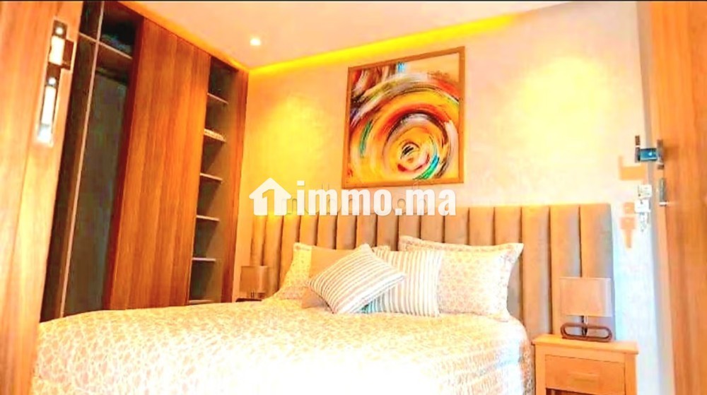 Appartement de vacances à louer en Centre ville.
Surface de 97 m².
Porte blindée et système de double vitrage - Vente Immobilier - El Jadida - photo 2