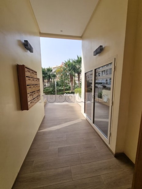 Location d'un appartement à Hay Massira. Surface de 96 m². Avec ascenseur et espace vert - Location Immobilier - Agadir - photo 1