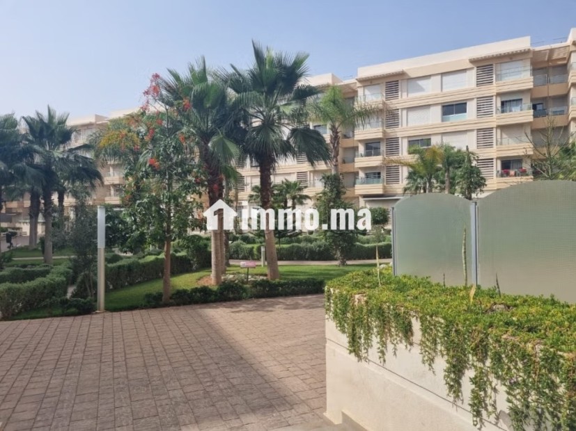 Location d'un appartement à Hay Massira. Surface de 96 m². Avec ascenseur et espace vert - Location Immobilier - Agadir - photo 2