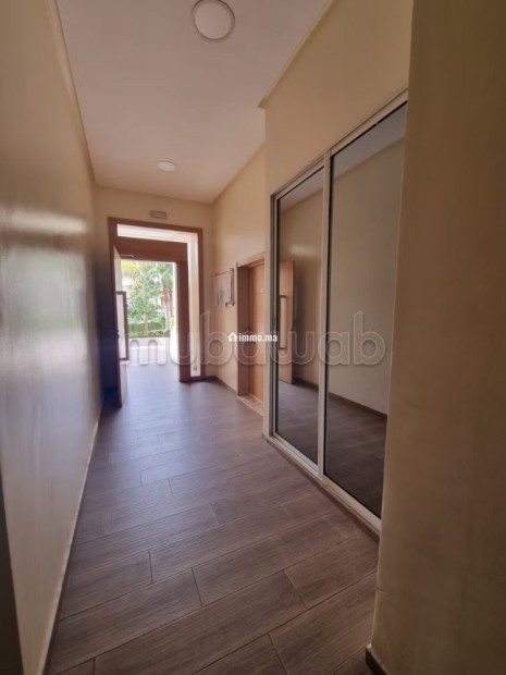 Location d'un appartement à Hay Massira. Surface de 96 m². Avec ascenseur et espace vert - Location Immobilier - Agadir - photo 4