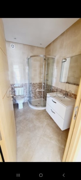 Location d'un appartement à Hay Massira. Surface de 96 m². Avec ascenseur et espace vert - Location Immobilier - Agadir - photo 6