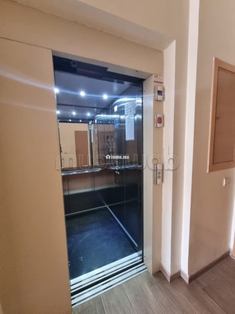 Location d'un appartement à Hay Massira. Surface de 96 m². Avec ascenseur et espace vert - Location Immobilier - Agadir - photo 7
