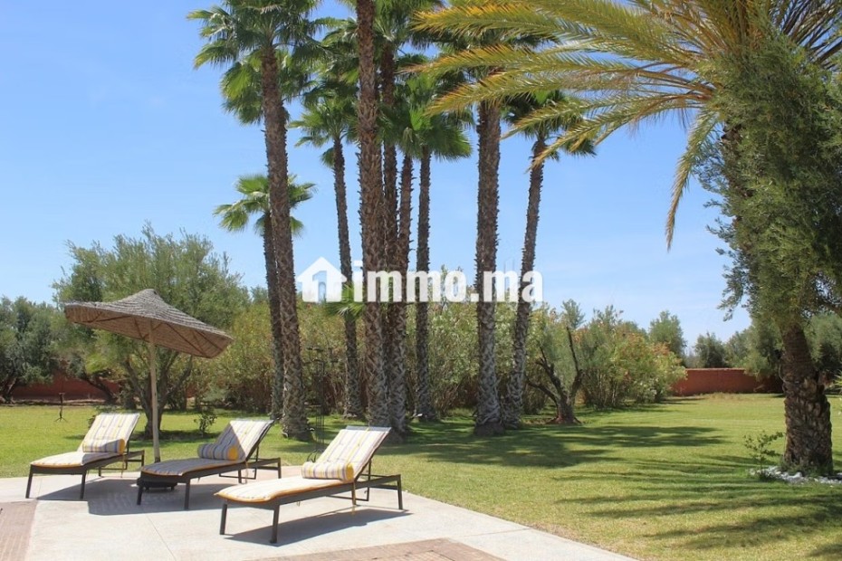 Grande villa édifié sur un luxuriant jardin arboré - Location Immobilier - Marrakech - photo 3