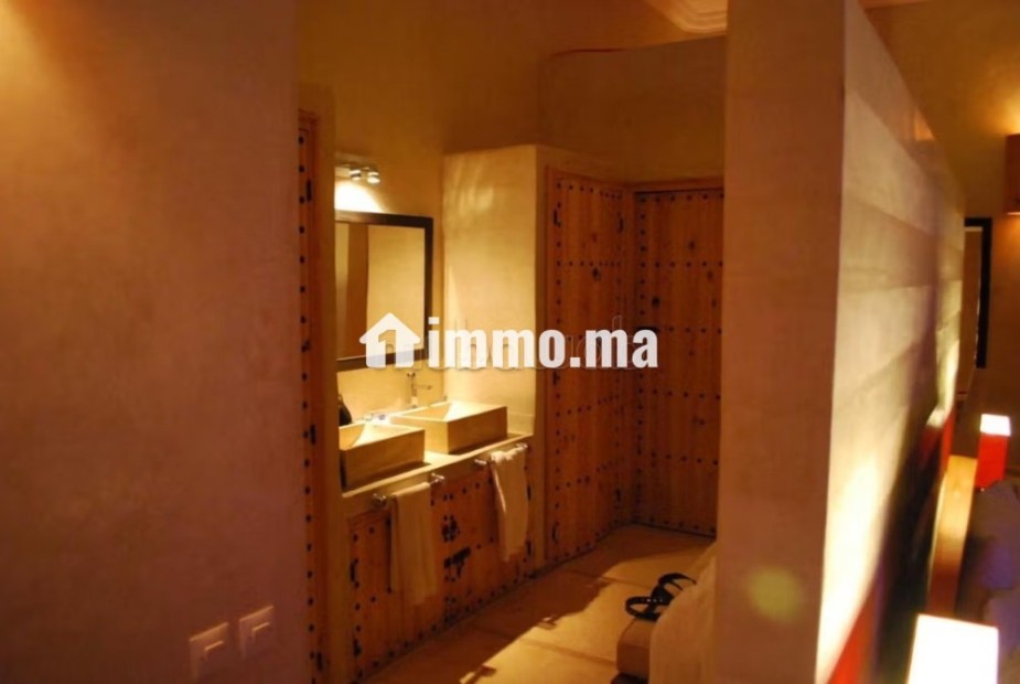 Grande villa édifié sur un luxuriant jardin arboré - Location Immobilier - Marrakech - photo 8