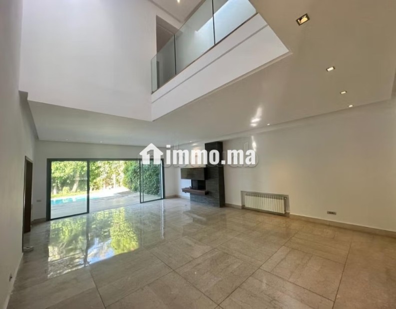 Magnifique villa à louer à Ain Diab. 4 chambres agréables. Cheminée et climatisation - Location Immobilier - Casablanca - photo 6