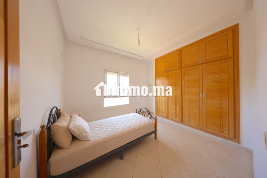 Appartement à louer en Centre. 3 chambres. Cheminée et concierge - Vente Immobilier - Fes - photo 8