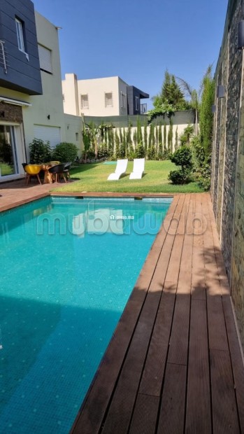 Maison de luxe à vendre à Bouskoura. 4 chambres. Salon traditionnel et porte blindée - Vente Immobilier - Bouskoura - photo 1