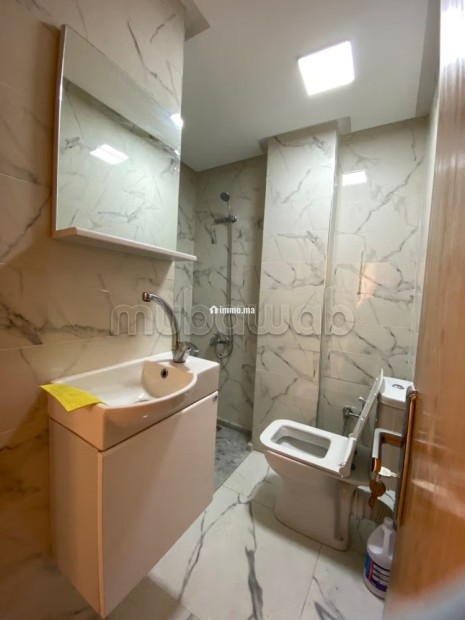 Appartement à l'achat à La Ville Haute. 2 belles chambres. Système de parabole et résidence sécurisée - Vente Immobilier - Kenitra - photo 8