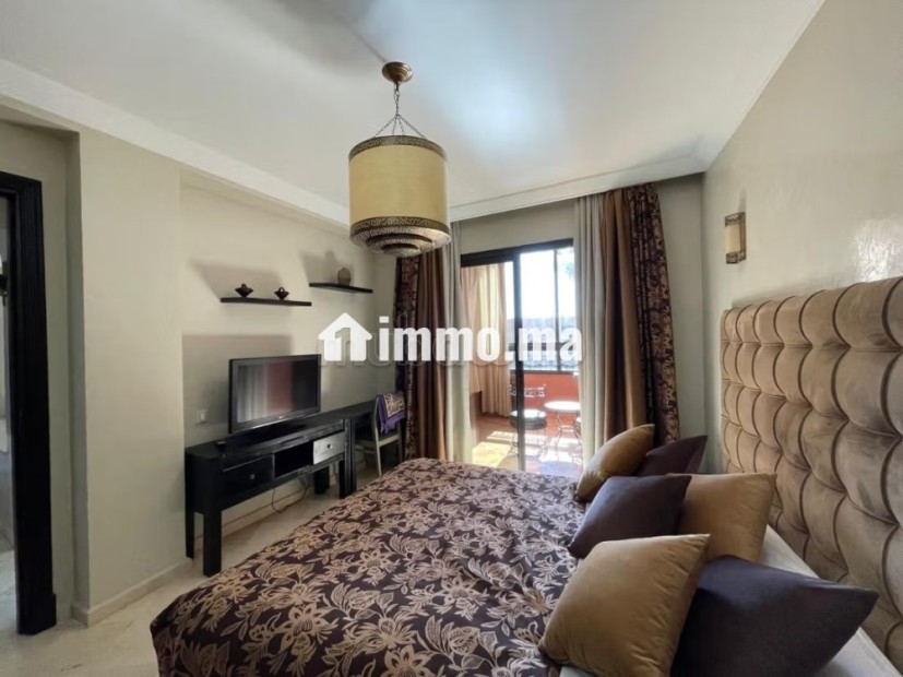 Appartement à louer 2chambres salon et terrasse vue piscine.
Bien meublé - Location Immobilier - Marrakech - photo 6