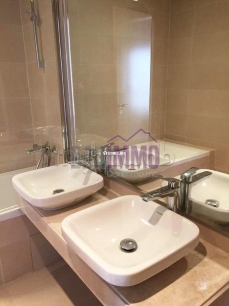 Bel appartement dans une résidence fermée à la Marina - Vente Immobilier - Autre - photo 2
