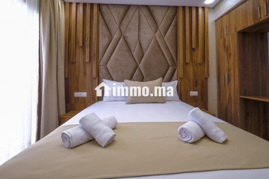 Appartement de vacances à louer à De La Plage. 2 chambres. Résidence avec concierge, climatisation générale - Vente Immobilier - Tanger - photo 7