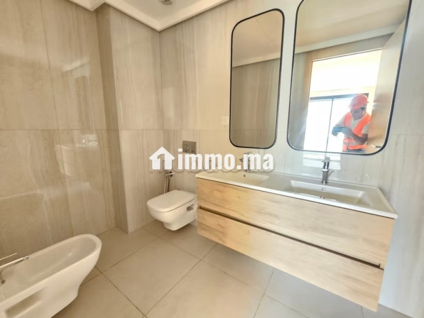 Joli appartement neuf avec terrasse - Location Immobilier - Casablanca - photo 7